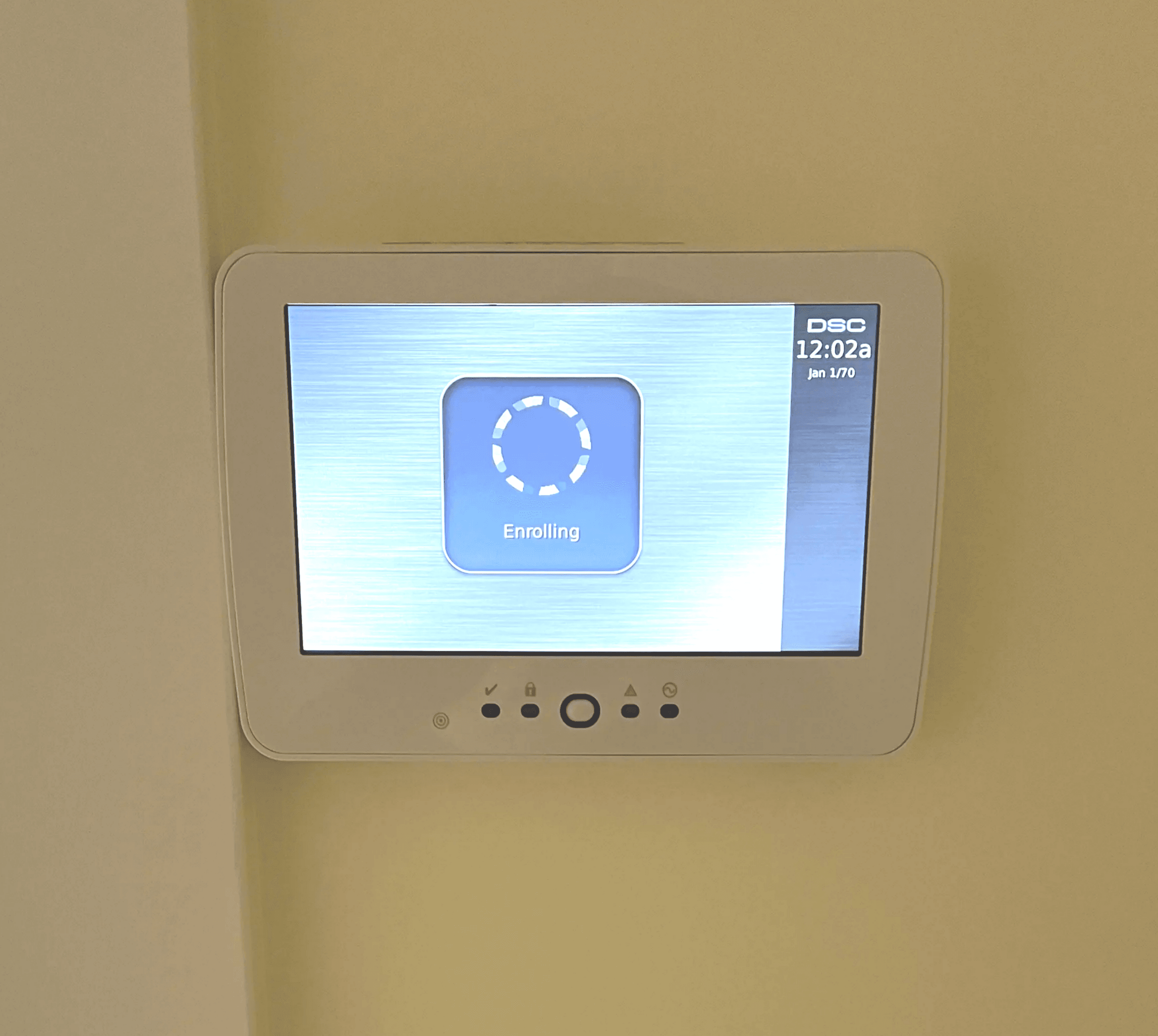Digital burglar alarm system keypad mounted on a wall by Axe Fire & Security to provide security and peace of mind.